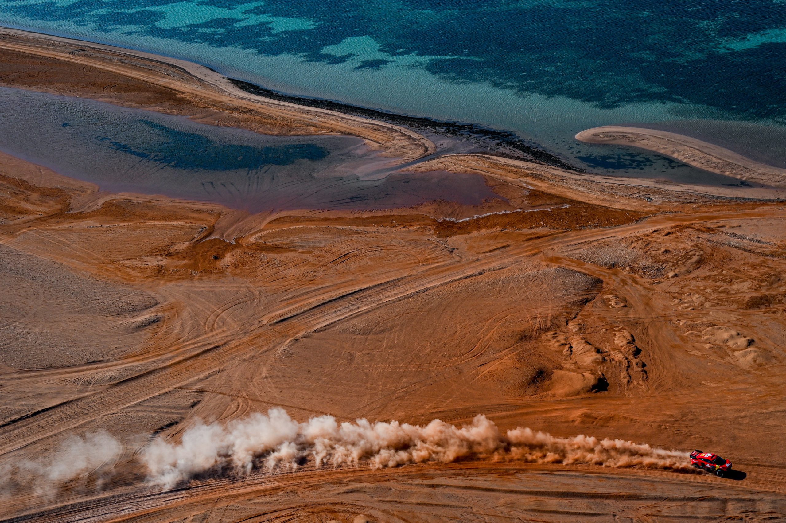 Nani Roma's Hunter zips across the Saudi desert landscape of the Dakar Rally.